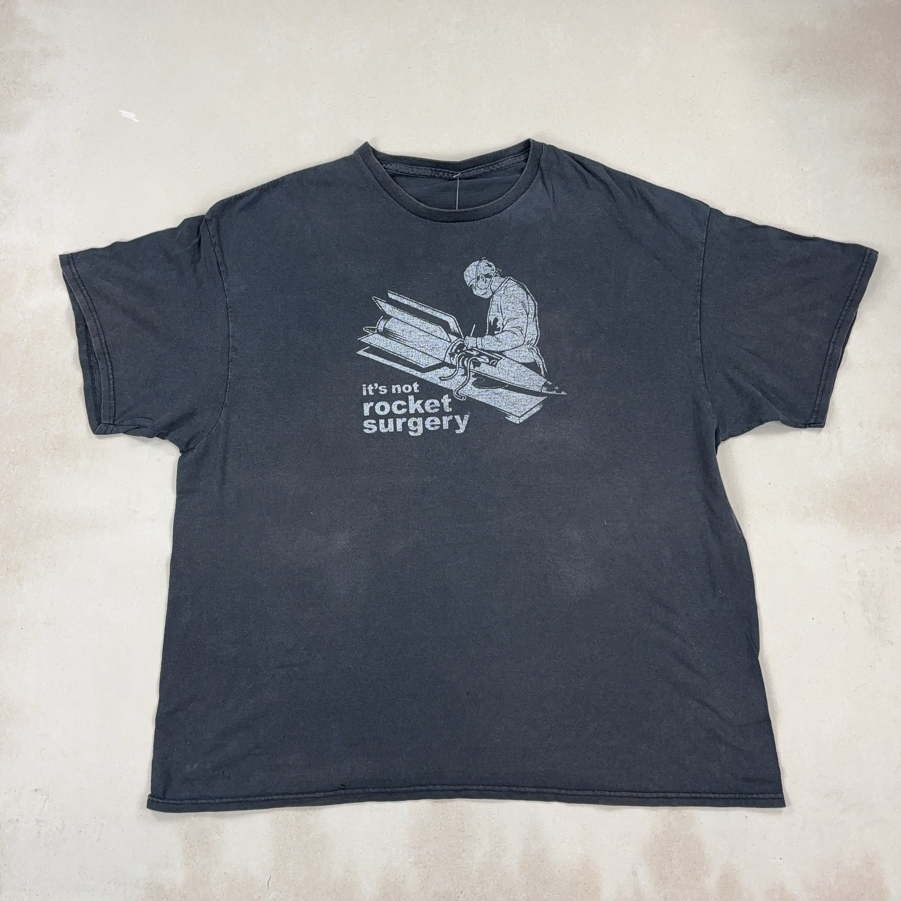 'IT'S NOT ROCKET SURGERY' TEE - X LARGE
