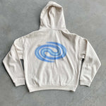 White hoodie with a blue spiral design on the back