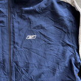 NAVY REEBOK SPRAY JACKET  X LARGE