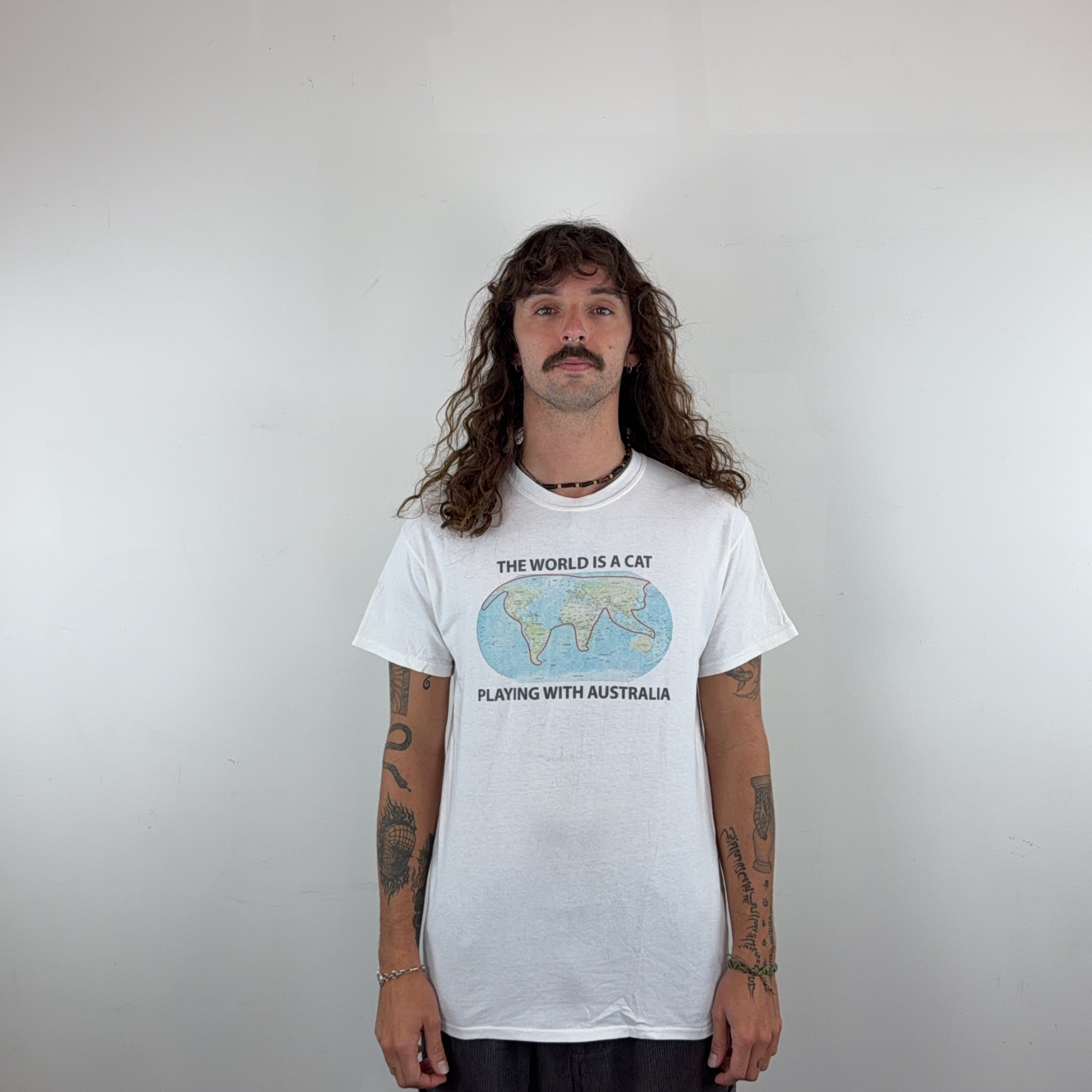 'THE WORLD IS A CAT PLAYING WITH AUSTRALIA' TEE - MEDIUM