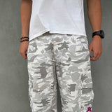 QUIKSILVER CAMO SHORTS 34